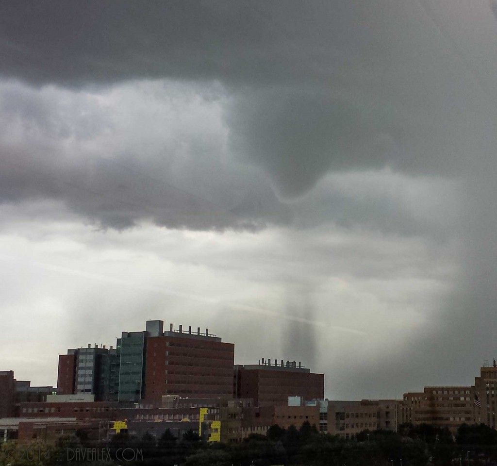 Finally the rain illuminates the tornado / landspout. 